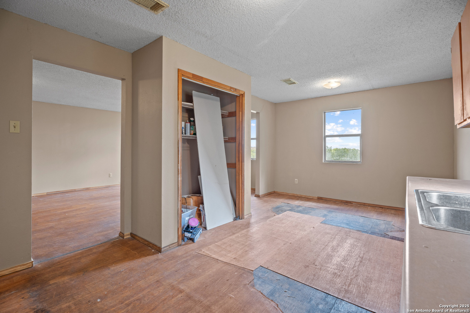 2862 Wetz Road Santa Clara, TX 78124 - Photo 12 of 37 an empty room with windows