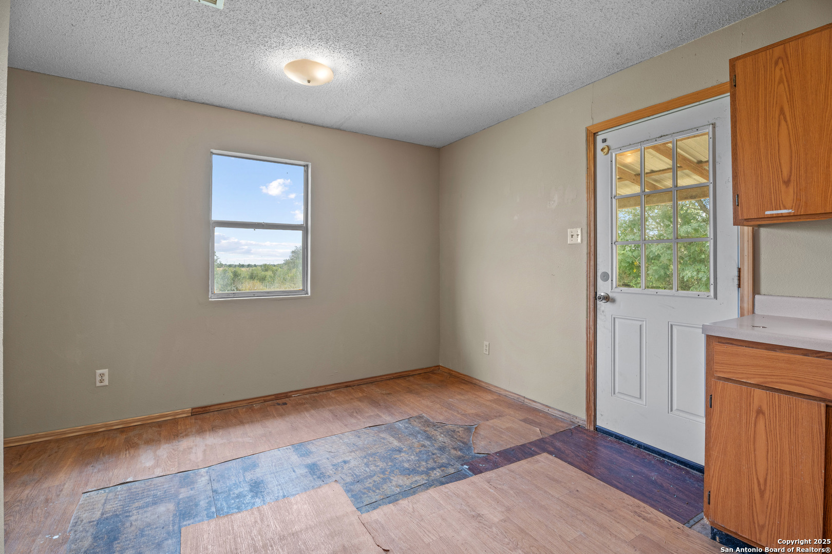 2862 Wetz Road Santa Clara, TX 78124 - Photo 14 of 37 an empty room with windows and closet