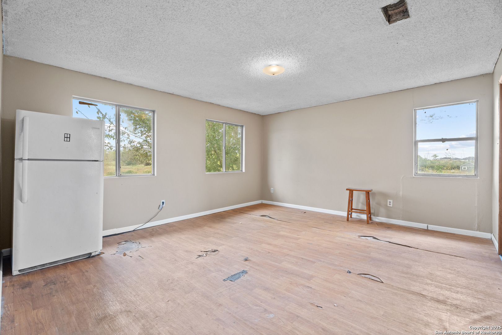 2862 Wetz Road Santa Clara, TX 78124 - Photo 15 of 37 a view of an empty room with a window