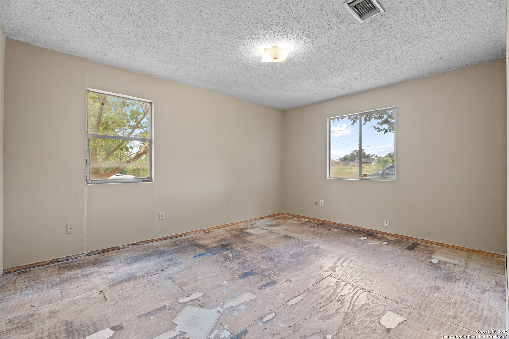 2862 Wetz Road Santa Clara, TX 78124 - Photo 22 of 37 a view of an empty room with a window