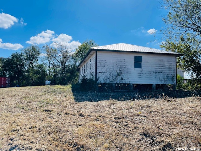 2862 Wetz Road Santa Clara, TX 78124 - Photo 33 of 37 a front view of a house with a yard