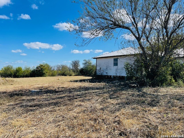 2862 Wetz Road Santa Clara, TX 78124 - Photo 34 of 37 a view of a house with a yard