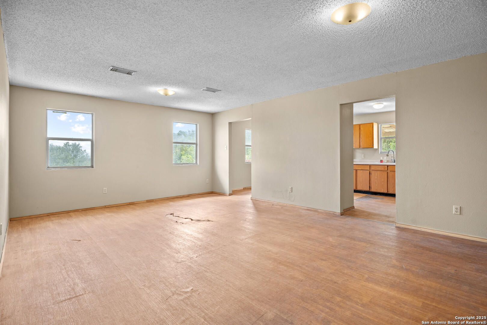 2862 Wetz Road Santa Clara, TX 78124 - Photo 7 of 37 a view of an empty room with a window