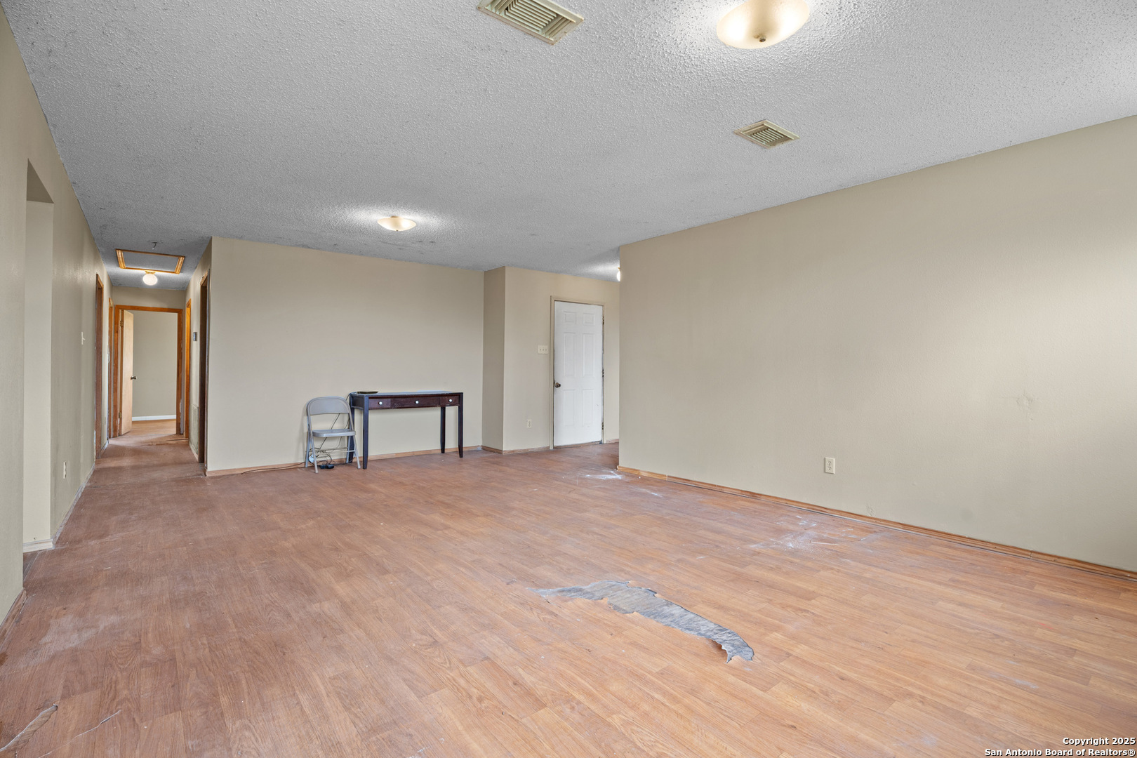 2862 Wetz Road Santa Clara, TX 78124 - Photo 8 of 37 a view of an empty room with wooden floor