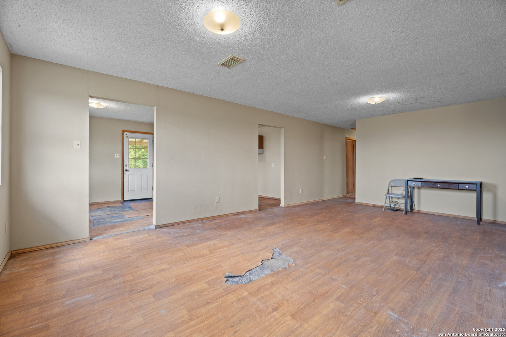 2862 Wetz Road Santa Clara, TX 78124 - Photo 9 of 37 a view of an empty room with closet and a window