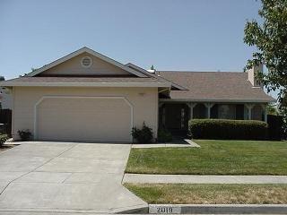 2019 Seville Street Santa Rosa, CA 95403 - Photo 1 of 6 a front view of a house with a yard
