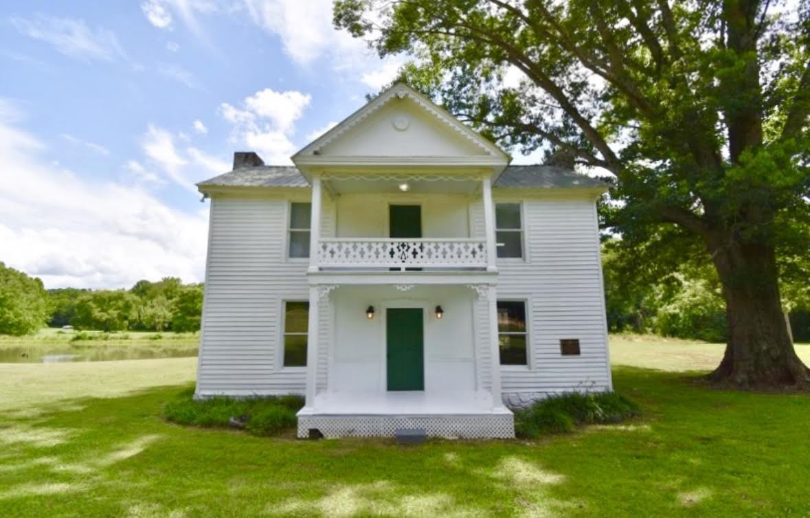 1097 Lower Lick Creek Road Linden, TN 37096 - Photo 1 of 45 a front view of a house with a yard