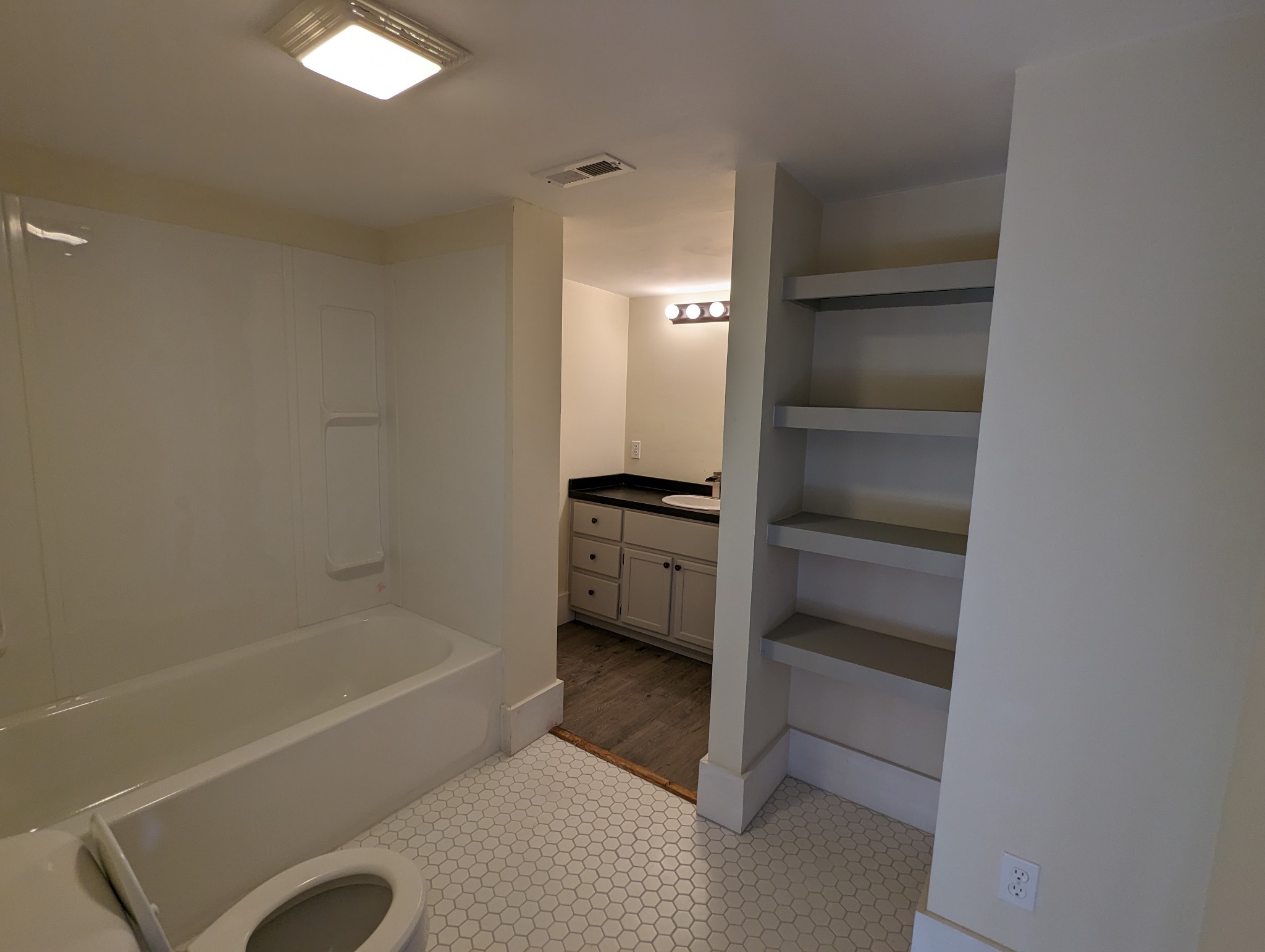 1097 Lower Lick Creek Road Linden, TN 37096 - Photo 25 of 45 a bathroom with a bathtub