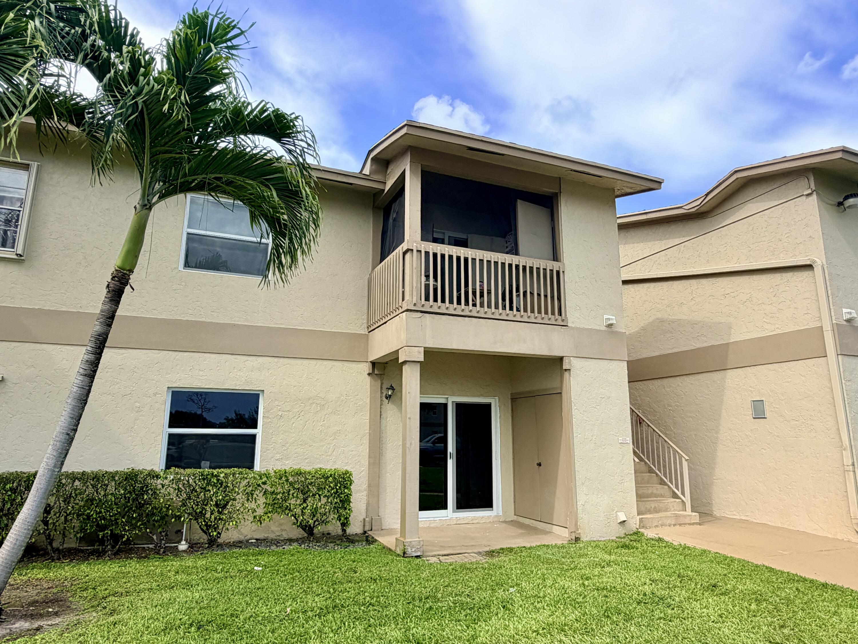 1766 Abbey Road, Unit 105 West Palm Beach, FL 33415 - Photo 8 of 8 ___F105 exterior