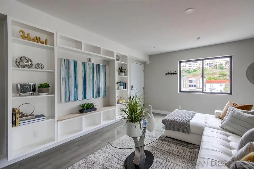 5548 Riley Street San Diego, CA 92110 - Photo 5 of 15 a living room with furniture and a potted plant
