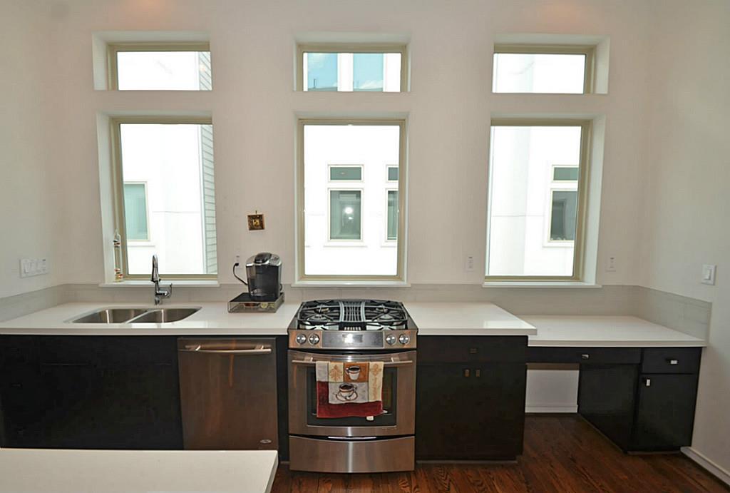 2713 Clay Street Houston, TX 77003 - Photo 10 of 24 Kitchen features an undermount sink & an office nook.
