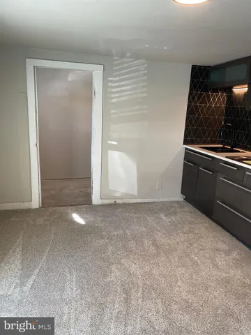 an empty room that has a window