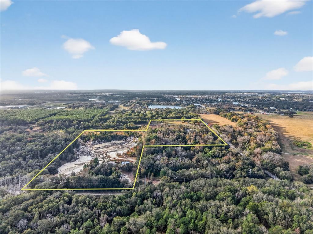 34934 Thrill Hill Road Eustis, FL 32736 - Photo 3 of 7 an aerial view of multiple house