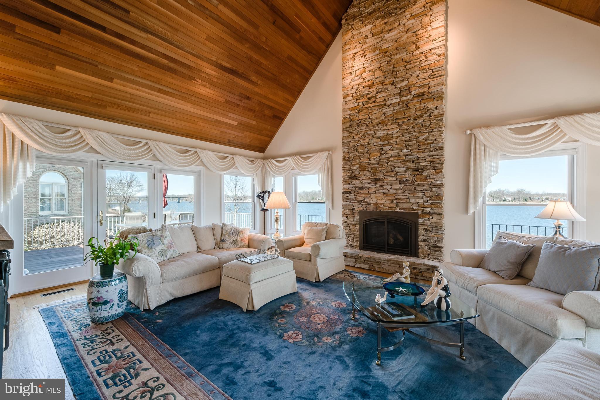 470 South River Landing Road, Unit 470 Edgewater, MD 21037 - Photo 4 of 30 Great room w/ stone gas FP, vaulted wood ceiling