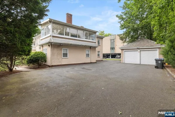 a view of a house with a street