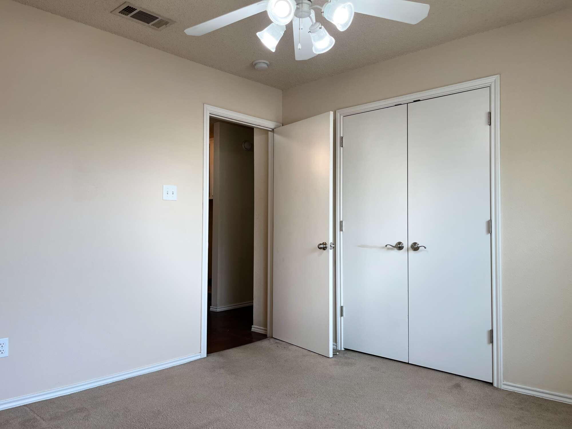 2401 73rd Street, Unit 6 Lubbock, TX 79423 - Photo 8 of 19 a view of an empty room