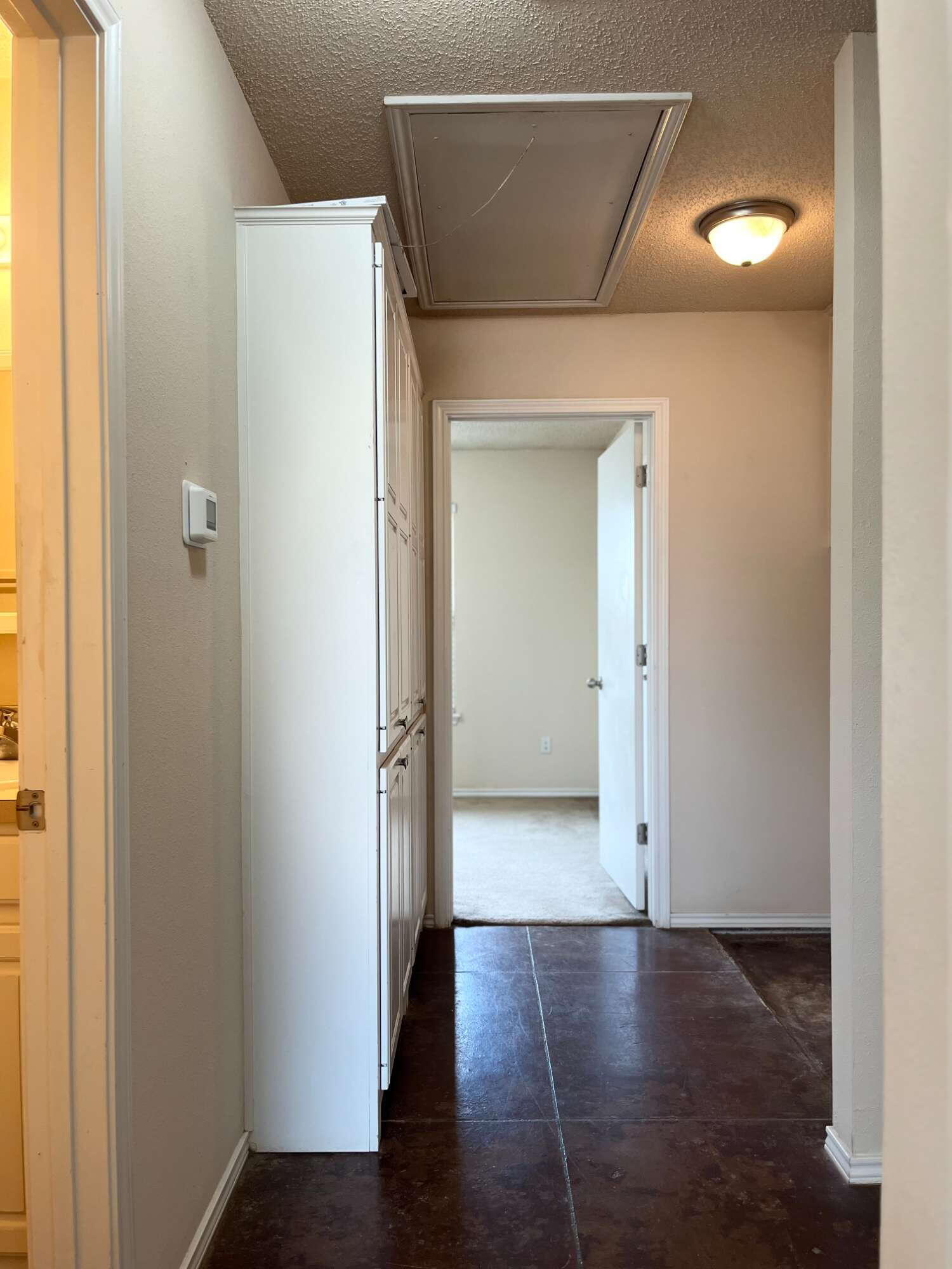 2401 73rd Street, Unit 6 Lubbock, TX 79423 - Photo 9 of 19 a view of a room with wooden floor