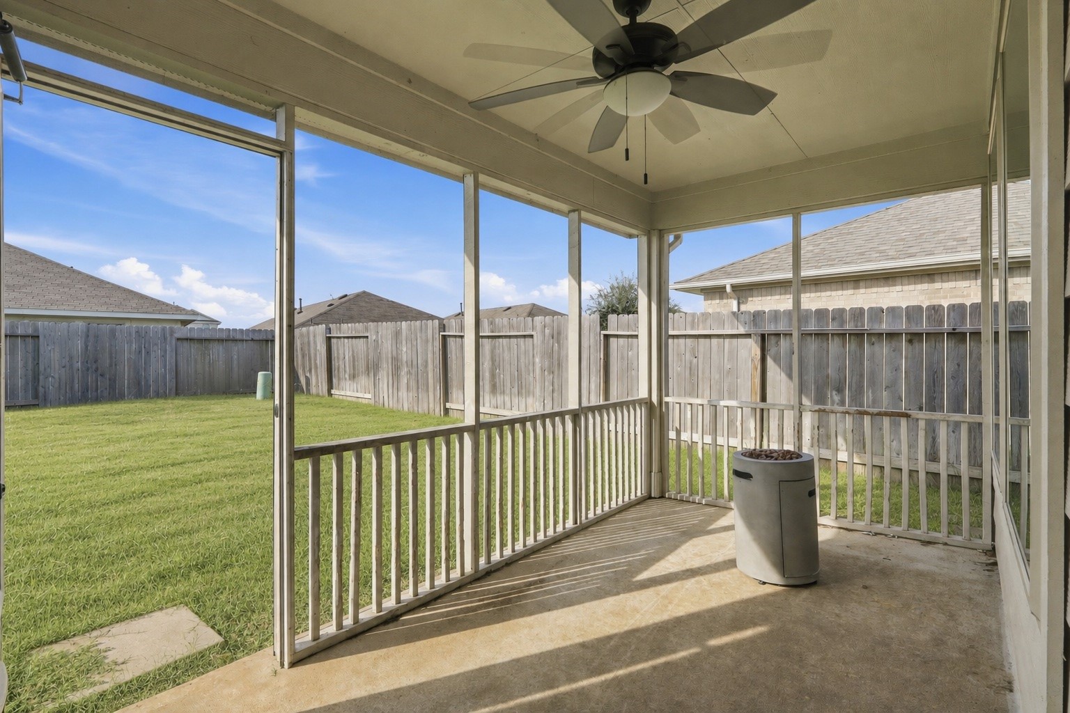 2346 Gold Forsythia Ln Spring Spring, TX 77373 - Photo 28 of 39 Spacious enclosed back porch perfect for relaxing, dining, or entertaining.