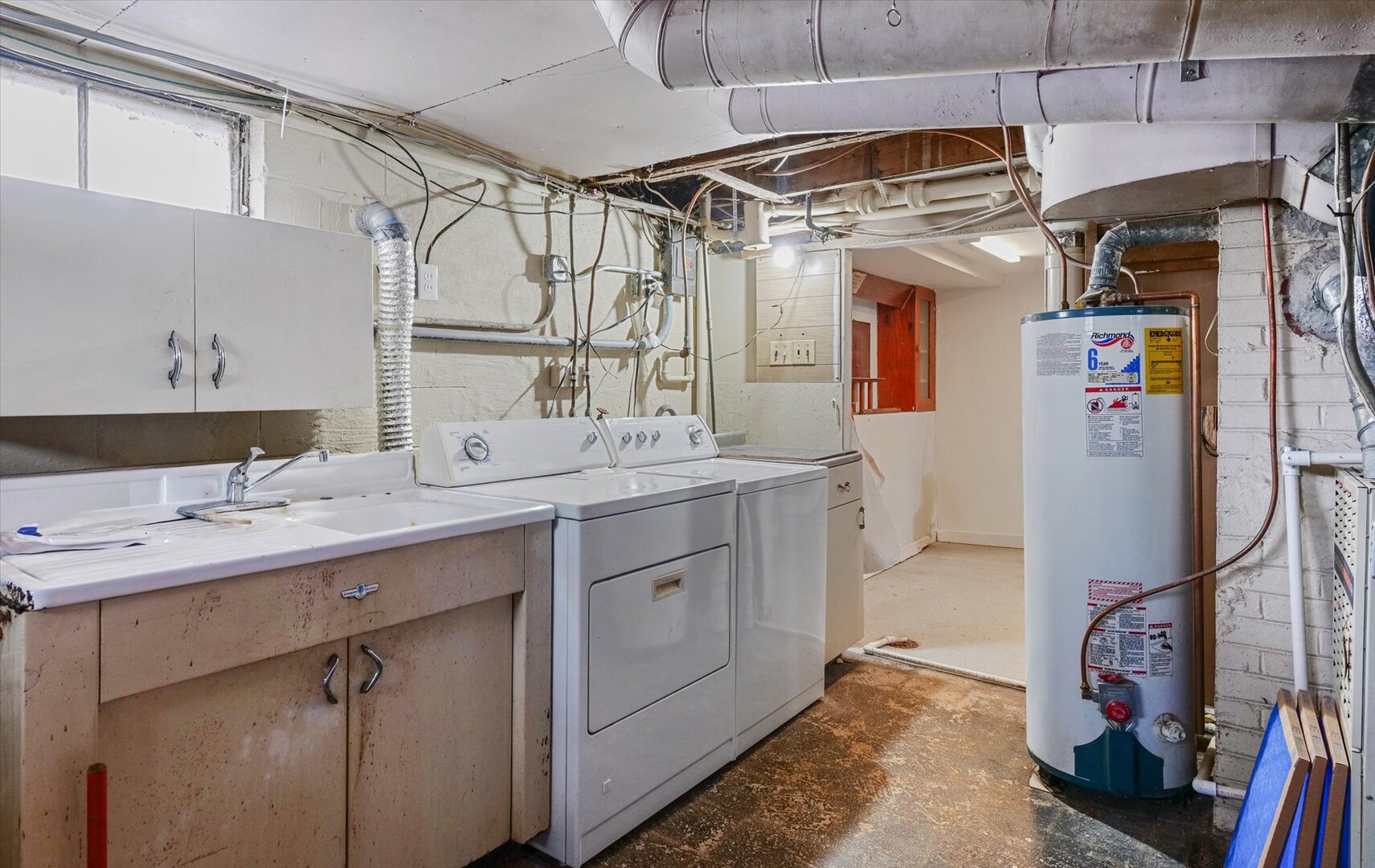 811 West Harvard Street Champaign, IL 61820 - Photo 25 of 34 a bathroom with a granite countertop sink a mirror a vanity and shower