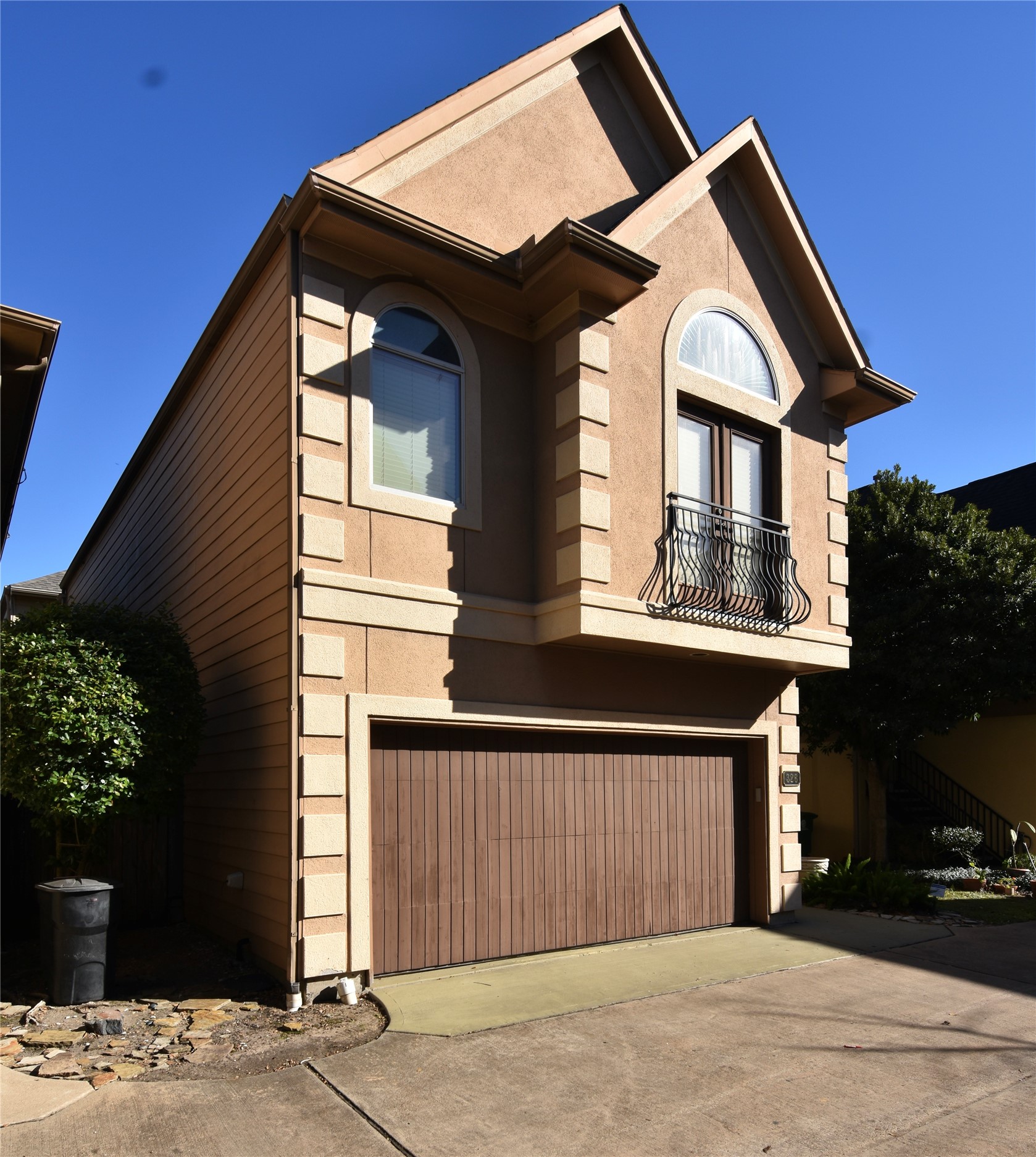 326 Gregg Street Houston, TX 77020 - Photo 2 of 26 a front view of a house with a yard