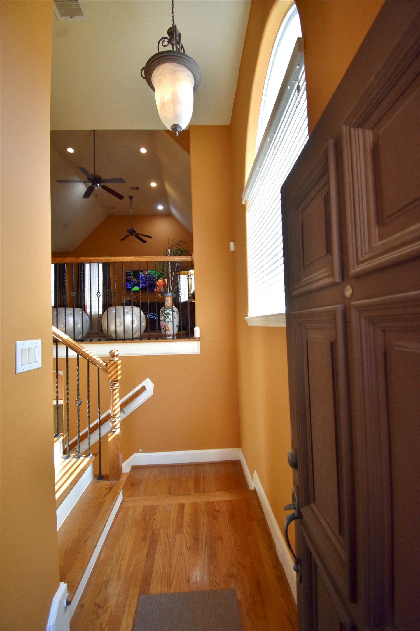 326 Gregg Street Houston, TX 77020 - Photo 3 of 26 a view of a room with rack on the wall and wooden floor
