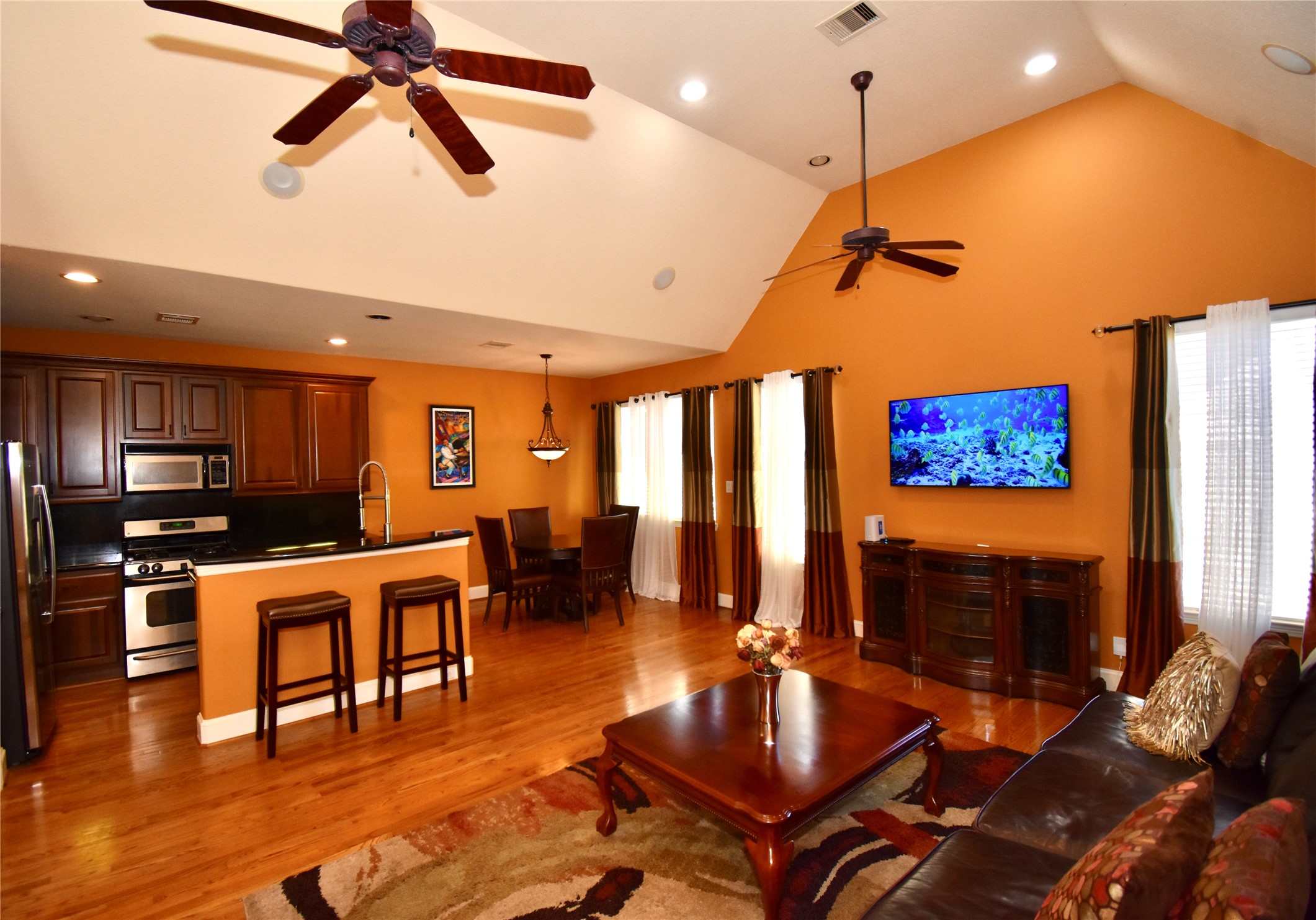 326 Gregg Street Houston, TX 77020 - Photo 7 of 26 a living room with stainless steel appliances furniture and kitchen view