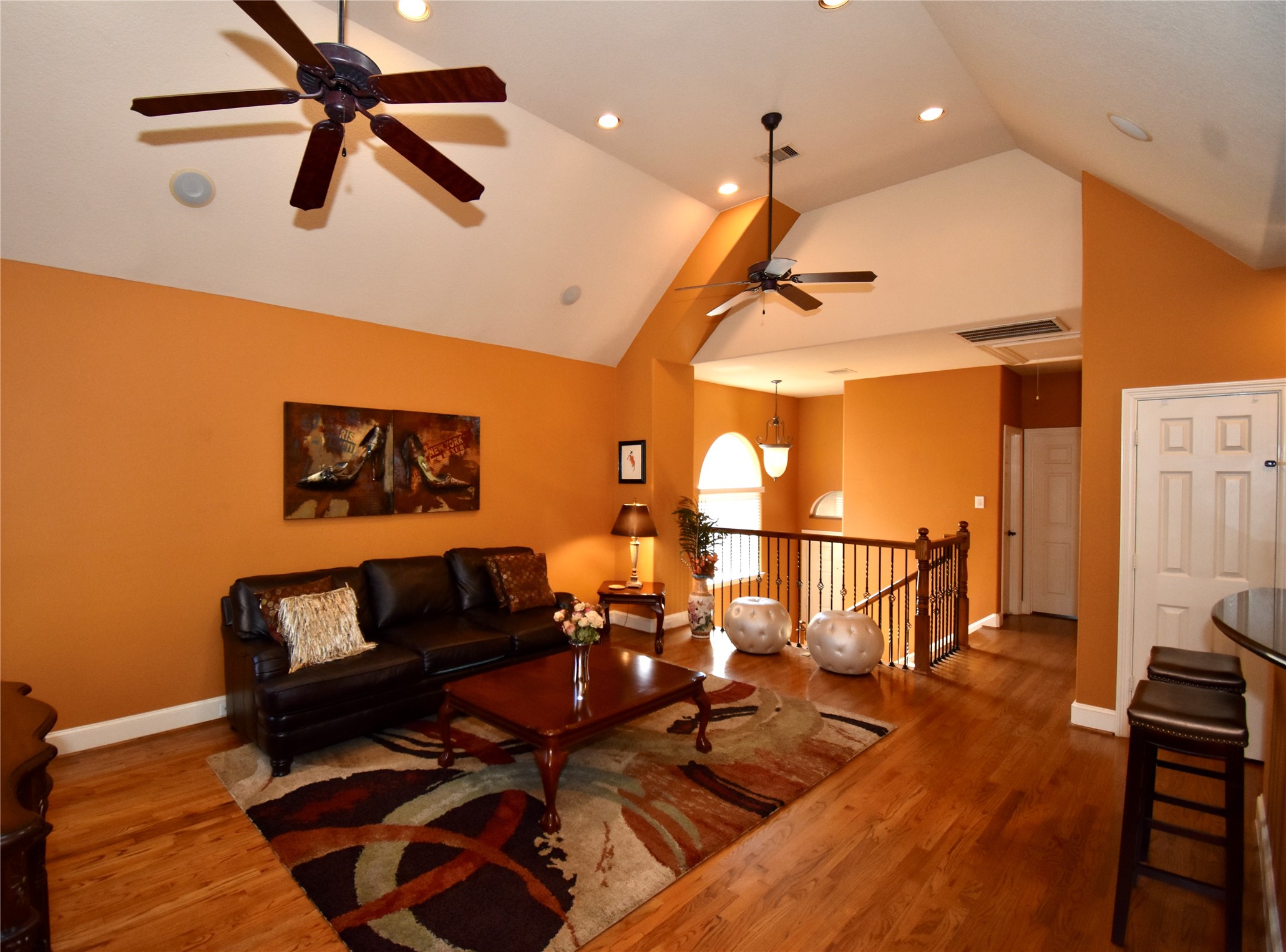 326 Gregg Street Houston, TX 77020 - Photo 9 of 26 a living room with lots of furniture and a ceiling fan