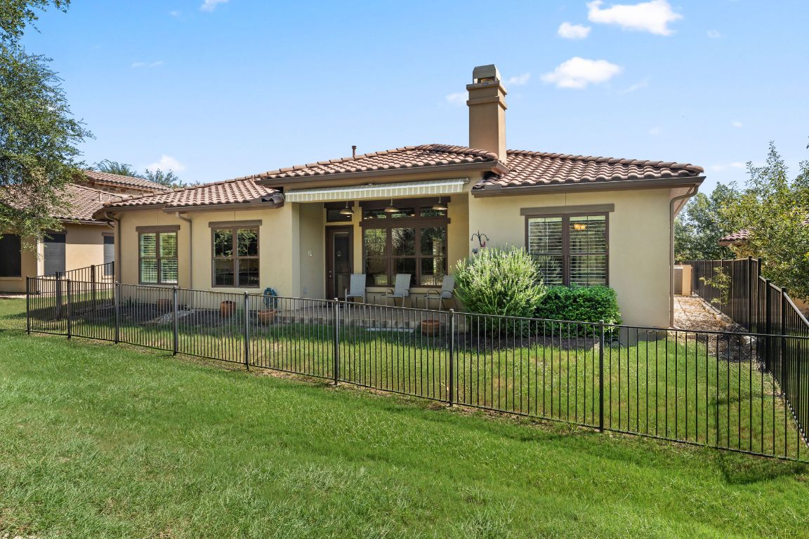 404 Amiata Avenue, Unit 34 Austin, TX 78734 - Photo 24 of 35 a front view of a house with a garden