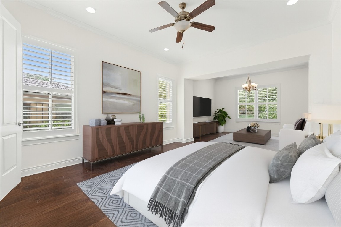 404 Amiata Avenue, Unit 34 Austin, TX 78734 - Photo 5 of 35 The primary bedroom has it only private living space that is currently virtually staged as a living area, but it could also be a workout area or office. Virtually staged.