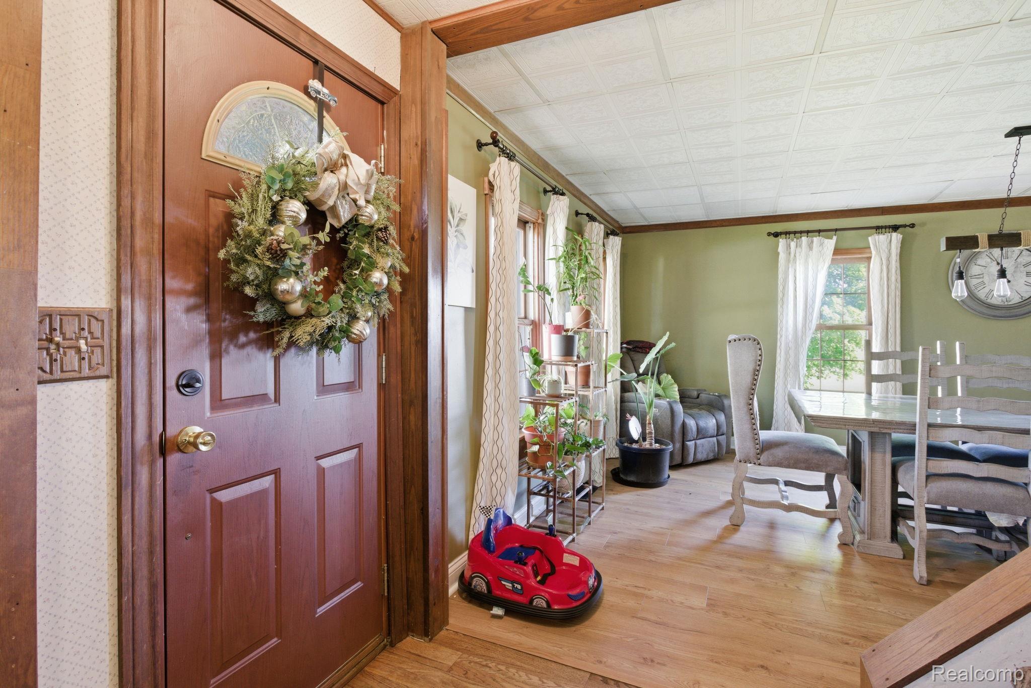 14104 Carleton West Road Carleton, MI 48117 - Photo 6 of 58 Foyer featuring light wood-style flooring