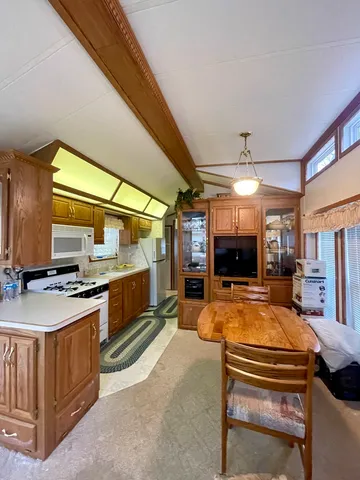 a kitchen with a stove and a sink