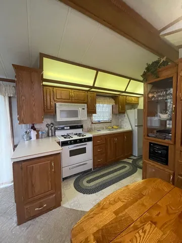 a view of a balcony with a washer and dryer