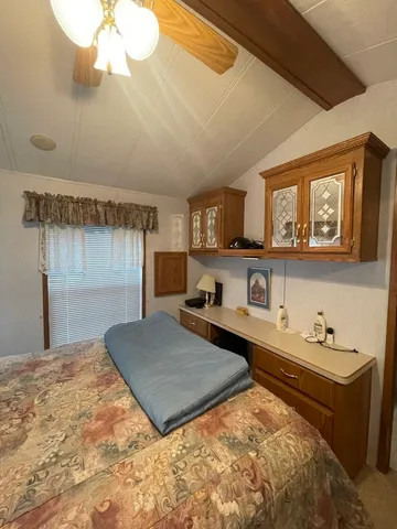 a view of outdoor space with deck and trees