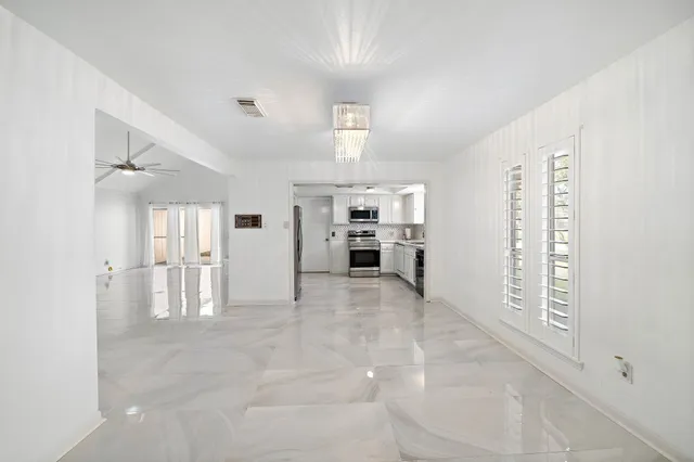 a view of work space with wooden floor