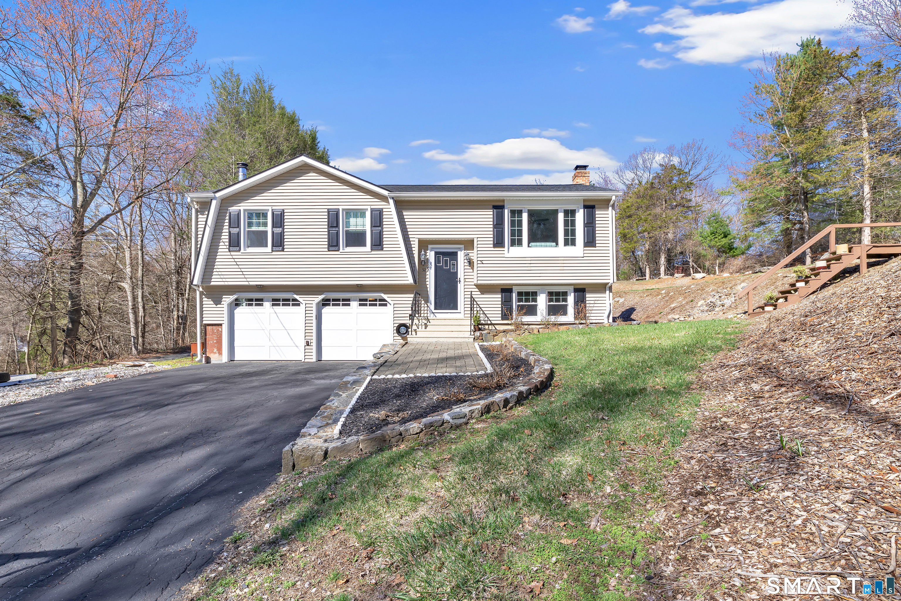 52 Cook Lane Beacon Falls, CT 06403 - Photo 1 of 1 a front view of a house with a yard and garage
