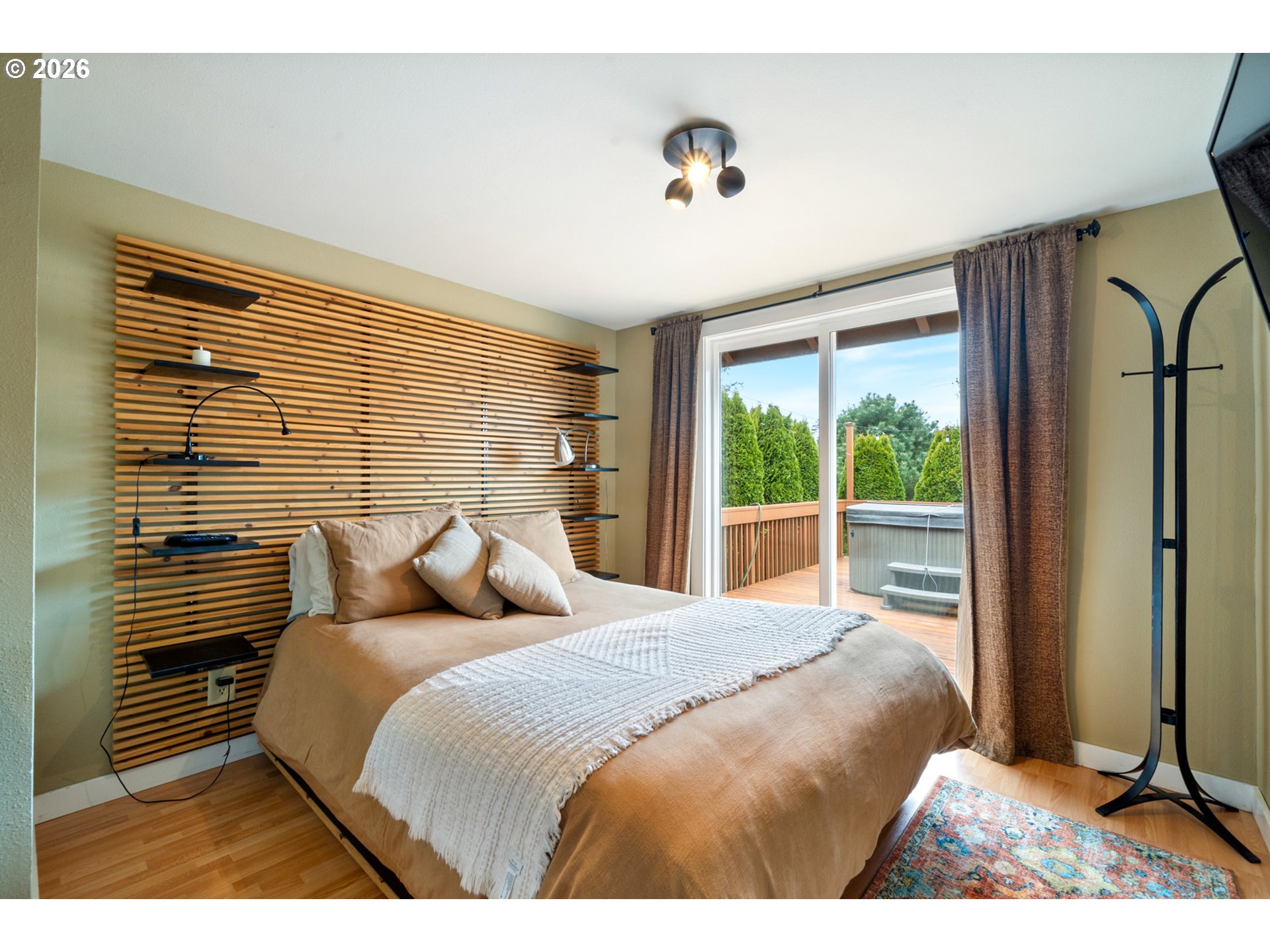 34650 2nd Street Cloverdale, OR 97112 - Photo 15 of 37 a bedroom with a bed and a window