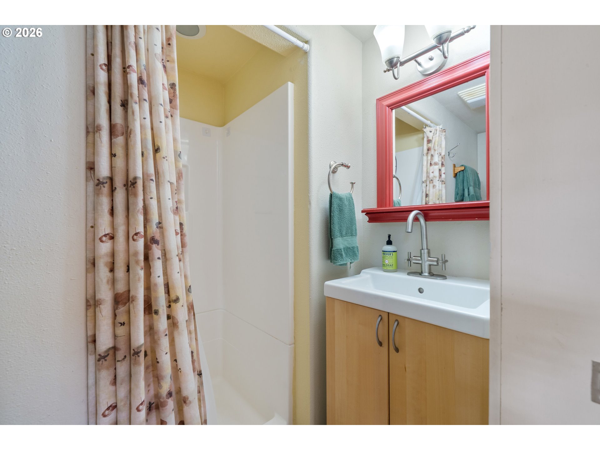 34650 2nd Street Cloverdale, OR 97112 - Photo 18 of 37 a bathroom with a sink and a mirror