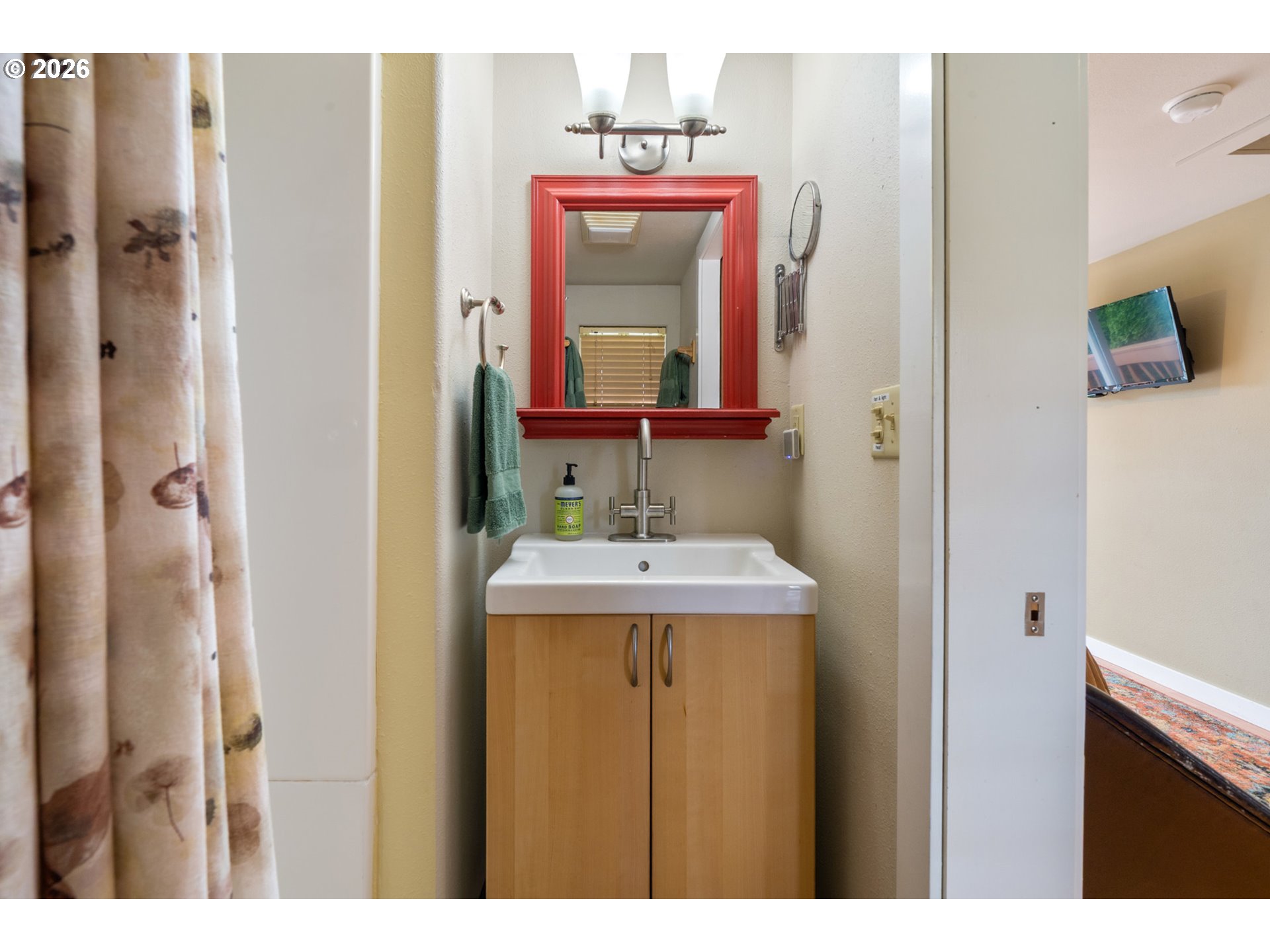 34650 2nd Street Cloverdale, OR 97112 - Photo 19 of 37 a bathroom with a sink and a mirror