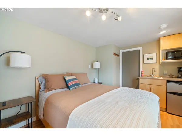 a kitchen with a stove and a microwave