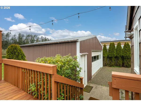 a view of a house with a yard and garage