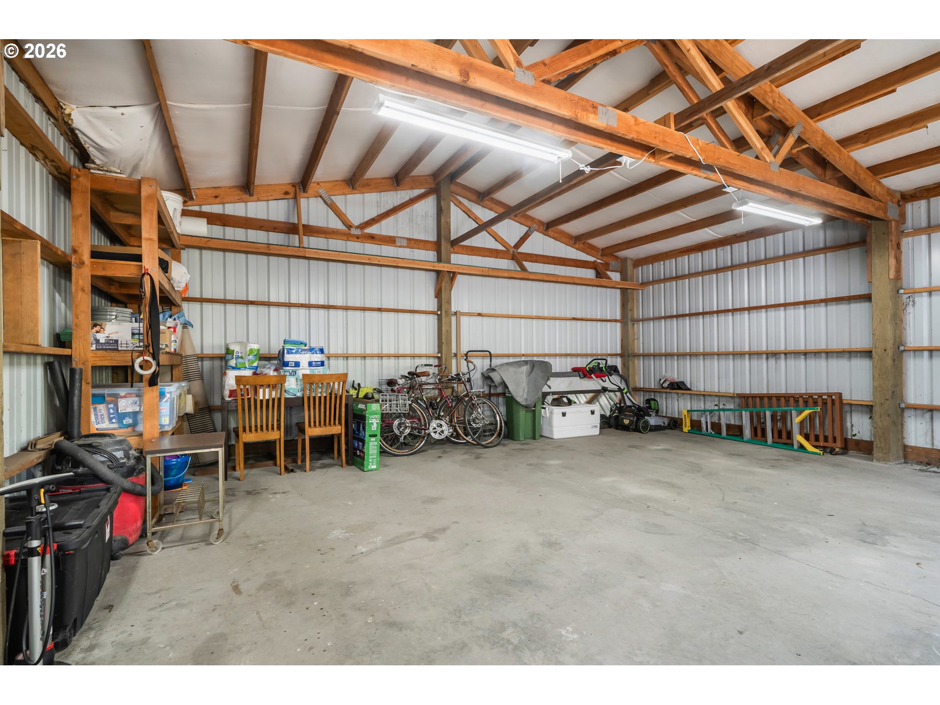 34650 2nd Street Cloverdale, OR 97112 - Photo 32 of 37 a view of a garage with cars
