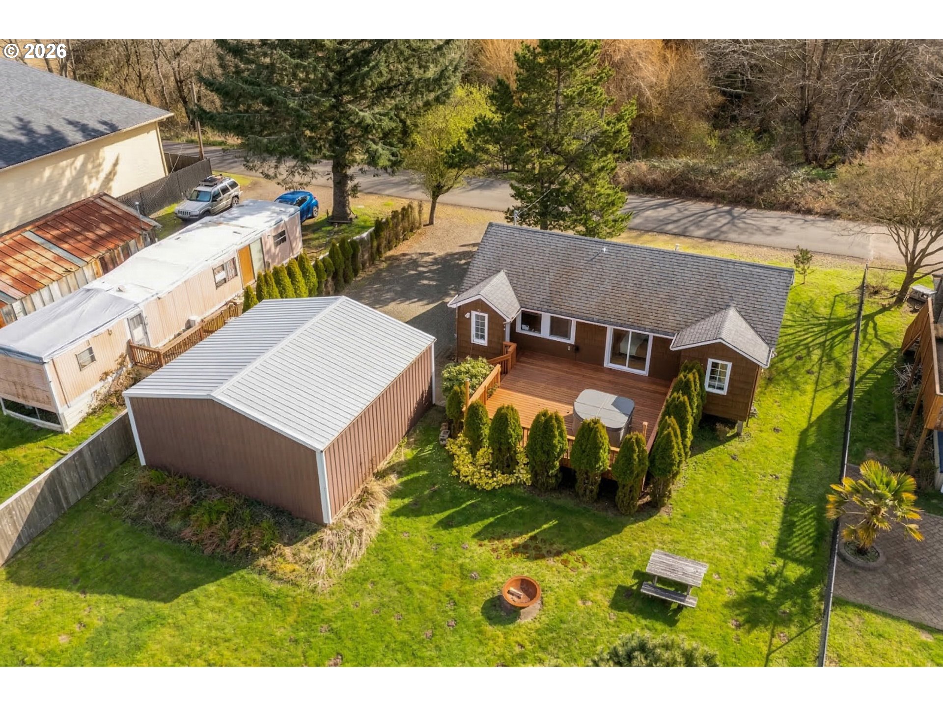 34650 2nd Street Cloverdale, OR 97112 - Photo 35 of 37 an aerial view of a house with a yard basket ball court and outdoor seating