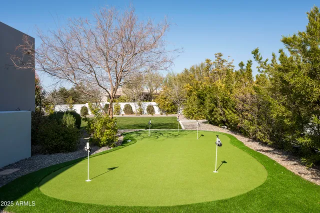 a view of an outdoor space and tennis court