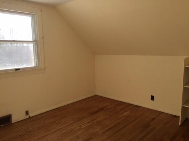 29 Madockawando Road Castine, ME 04421 - Photo 23 of 30 Guest room with wood floors, shelves...