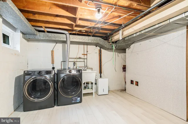 a utility room with dryer and washer