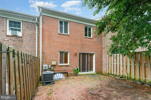 a backyard of a house with seating space