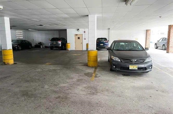 3900 Liberty Avenue, Unit 1B North Bergen, NJ 07047 - Photo 13 of 15 a car parked in garage
