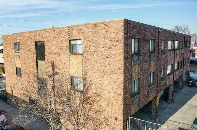 3900 Liberty Avenue, Unit 1B North Bergen, NJ 07047 - Photo 2 of 15 a brick building with a large windows