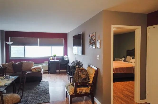 3900 Liberty Avenue, Unit 1B North Bergen, NJ 07047 - Photo 7 of 15 a bedroom with furniture and a window