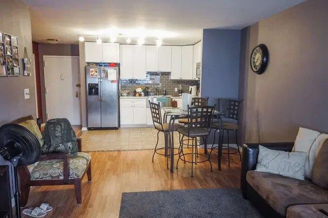 3900 Liberty Avenue, Unit 1B North Bergen, NJ 07047 - Photo 9 of 15 a living room with furniture and kitchen view